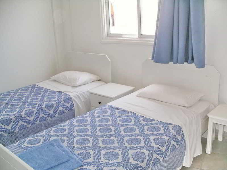 Renos Hotel Apts Полис Екстериор снимка