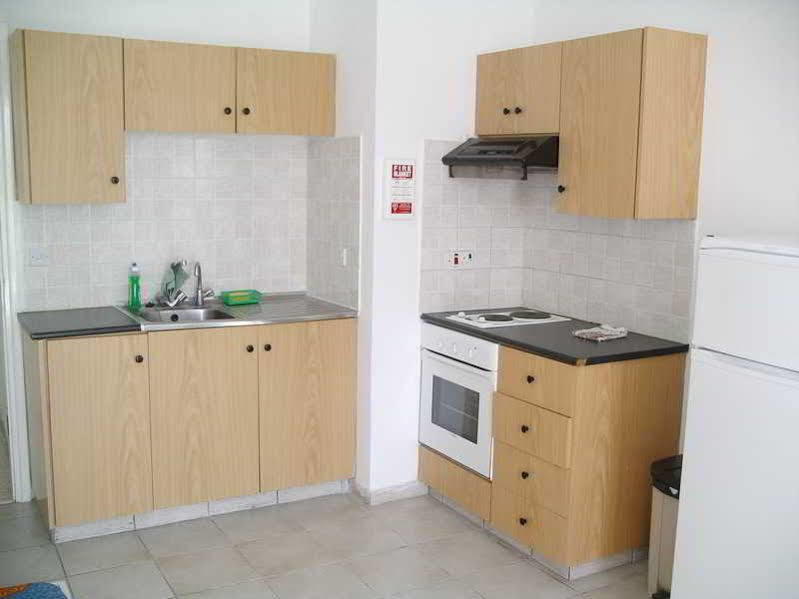 Renos Hotel Apts Полис Екстериор снимка